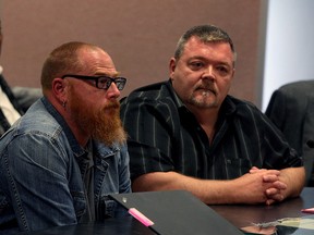 Steve Green, centre, GM of Downtown Windsor Farmers' Market, and Mike Holdsworth, president of Downtown Residents Association (Windsor), speak with City Council on issue of lowering of fees, Monday.