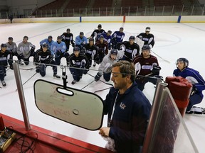 Flint Firebirds head coach John Gruden is shown with his players Wednesday, Sept. 9, 2015, at the Iceland Arena in Flint, Mich. during practice where the team is preparing for their inaugural season in the Ontario Hockey League. (DAN JANISSE/The Windsor Star)