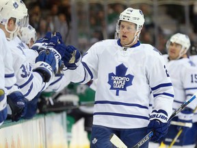 Peter Holland #24 of the Toronto Maple Leafs celebrates his goal in the first period against the Dallas Stars at American Airlines Center on November 10, 2015 in Dallas, Texas.  (Photo by Ronald Martinez/Getty Images)