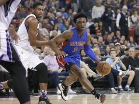 Detroit Pistons forward Stanley Johnson, right, drives against Sacramento Kings forward Rudy Gay during the first quarter of an NBA basketball game in Sacramento, Calif., Wednesday, Nov. 11, 2015. (AP Photo/Rich Pedroncelli)