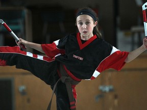 Abbey Morneau of Karate Rocks trains with the kama before a tournament. (DAN JANISSE/The Windsor Star)