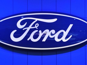 The Ford Motor Company logo at the North American International Auto Show January 14, 2014 in Detroit. (Stan Hondastan/AFP/Getty Images)