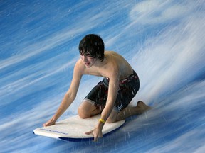 Kaden Roy rides the flowrider at the Adventure Bay Family Water Park in Windsor on Wednesday, January 29, 2014.                             (TYLER BROWNBRIDGE/The Windsor Star)