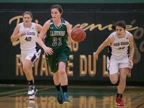 E.J. Lajeunesse forward, Lauren Golding, brings the ball up the court against Jean Vanier in the OFSAA girls basketball A gold medal game at Ecole Secondaire Catholique E.J. Lajeunesse, Saturday, Nov. 28, 2015. Jean Vanier defeated E.J. Lajeunesse 44-40. (DAX MELMER/The Windsor Star)