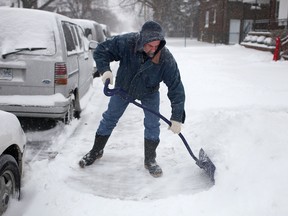 A man shovels snow in this file photo. (Dax Melmer/Windsor Star)