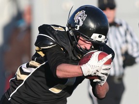 General Amherst's Mitch Wright scores a second half touchdown during the WECSSAA Arnott Conference playoff  senior football final against Massey at Alumni Field in Windsor, Ontario.  (JASON KRYK/WINDSOR STAR)