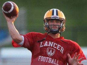 University of Windsor quarterback Austin Kennedy is shown during practice on Wednesday, Sept. 3, 2014 at the Alumni Field in Windsor, ON. (DAN JANISSE/The Windsor Star)