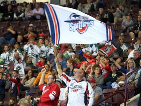 Fans celebrate a first-period Windsor Spitfires goal during  the Ontario Hockey League opening game against the Erie Otters at the WFCU Centre September 24, 2015. (JASON KRYK/The Windsor Star)
