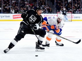 Ex-Spit Jordan Nolan, left, of the Los Angeles Kings makes a move past Nick Leddy #2 of the New York Islanders during the second period at Staples Center on November 12, 2015 in Los Angeles, California.  (Photo by Harry How/Getty Images)
