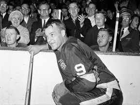 In this Nov. 10, 1963 file photo, the Detroit Red Wings' Gordie Howe acknowledges applause from the fans during a 20-minute standing ovation after he scored the 545th cgoal of his National Hockey League career at Detroit's Olympia Stadium, to set the leagues' to set the all-time scoring mark.