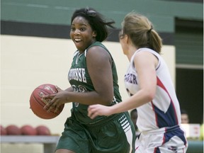 In this file photo, E.J. Lajeunesse's Asina Landu-Wabisa, left, drives to the basket while being defended by Jean Vanier's Kendel Dunn in the OFSAA girls basketball A gold medal game at E.J. Lajeunesse, Saturday, Nov. 28, 2015. Jean Vanier defeated E.J. Lajeunesse 44-40.