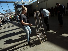 Engineering students take part in a contest at the Engineering Building at the University of Windsor in Windsor on Friday, November 20, 2015. Teams of students were competing to see who could build a rolling machine with only popsicle sticks and CD's. The contraptions then competed for the most distance.