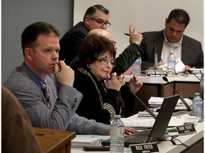 Amherstburg councillors Rick Fryer, left, Diane Pouget, deputy mayor Bart DiPasquale, behind, finance director Justin Rousseau and CAO John Miceli, right, during council meeting March 31, 2015.