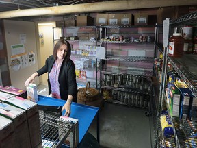 Lady Laforet, executive director at The Well-Come Centre in Windsor, is shown in the organization's food bank on Nov. 19, 2015.
