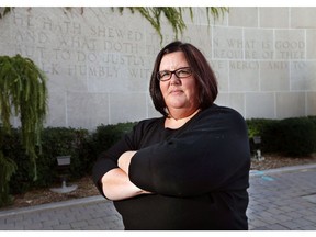 WINDSOR, ONTARIO, SEPT. 24, 2015 - Parents of students at a French language school in Leamington are upset over town council's refusal to fly the Franco-Ontario flag at town hall on Friday when Franco-Ontarians celebrate their French roots. Rachelle Lauzon, a parent council president in Leamington poses at the Windsor City Hall square on Thursday, Sept. 24, 2015, where the city will fly the flag.(DAN JANISSE/The Windsor Star)