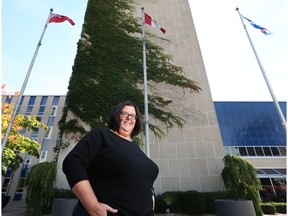 WINDSOR, ONTARIO, SEPT. 24, 2015 - Parents of students at a French language school in Leamington are upset over town council's refusal to fly the Franco-Ontario flag at town hall on Friday when Franco-Ontarians celebrate their French roots. Rachelle Lauzon, a parent council president in Leamington poses at the Windsor City Hall square on Thursday, Sept. 24, 2015, where the city will fly the flag. (DAN JANISSE/The Windsor Star)