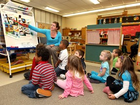 Percy P. McCallum school teacher Alissa Van Schalkwyk works with junior and senior kindergarten students in this file photo.