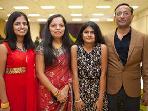 The Patel family, from left, Zeel Shilpa, Hima, and Sanjay, attend the Gujarati Samaj of Windsor Diwali Dinner at the St. Cyril's Slovak Centre, Saturday, Nov. 14, 2015. (DAX MELMER/The Windsor Star)