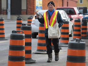 Goodfellow volunteer Peter Syring works at the intersection of Pilette and Tecumseh on Thursday, November 26, 2015, in Windsor, Ont.