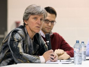 Karen Pitre, special advisor on community hubs, and Sam Andrey, policy advisor, Office of the Minister of Education, (right) answer questions during a special meeting to discuss the future of Harrow High School at the Essex Sportsplex in Essex on Monday, Nov. 23, 2015.
