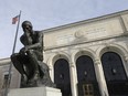 In a photo from Dec. 10, 2013 at the Detroit Institute of Arts in Detroit, The Thinker, a sculpture by Auguste Rodin is seen outside the art museum.