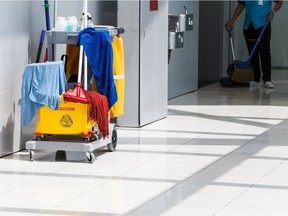 Janitorial worker and cleaning in process. (Fotolia.com)
