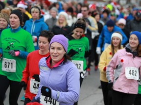 Runners take part in the 2013 Jingle Bell Run, which raises money for Community Living Essex County, in Essex.