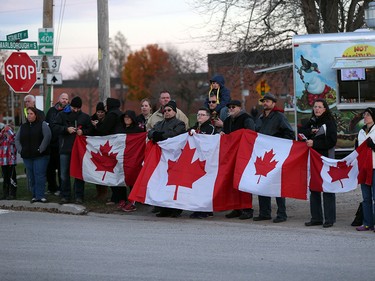 A  Highway of Heroes procession for John Gallagher  arrives at in Blenheim, Ontario on November 20, 2015.  Gallagher was killed battling ISIS in Syria.  A procession travelled down the Highway of heroes from Toronto to Blenheim, Ontario.