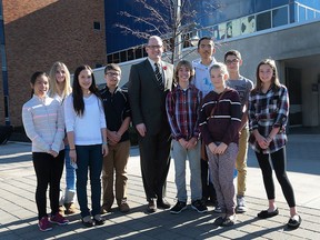 Windsor Mayor Drew Dilkens poses with local grade 9 students on Wednesday, Nov. 4, 2015. It was take your kids to work day and the students were getting a tour of city hall.