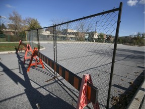 The south-side parking lot at the John McGivney Children's Centre is closed by the Ministry of Environment due to a methane gas leak, Saturday, Nov. 7, 2015.