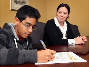 Prasanna Mohile, 13, is pictured with Windsor West MPP Lisa Gretzky at her constituency office on Thursday, November 12, 2015. Mohile has been chosen to be part of the  Page program in the Legislative Assembly of Ontario.