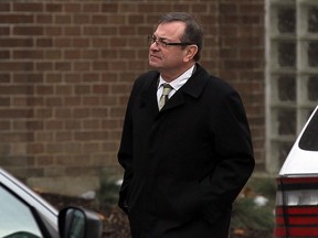 Robert Couture walks towards Superior Court in Windsor on Tuesday, Nov. 24, 2015.