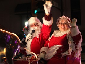 Santa Claus and Mrs. Claus wave to spectators at the Santa Claus Parade in Leamington in this file photo.