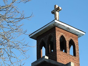 File photo. The steeple of the original church house of St. George's Anglican Church in the Walkerville area is shown on Wednesday, Nov. 4, 2015.