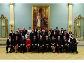 The new Liberal cabinet. Prime Minister Justin Trudeau, fifth from left, and Governor General David Johnston, centre, pose for a group photo with the new Liberal cabinet at Rideau Hall in Ottawa on Wednesday, Nov. 4, 2015. Front row, left to right: Minister of Public Safety and Emergency Preparedness Ralph Goodale, Minister of Justice and Attorney General of Canada Jody Wilson-Raybould, Minister of Foreign Affairs Stephane Dion, Minister of International Trade Chrystia Freeland, Prime Minister Justin Trudeau, also minister of intergovernmental affairs and youth, Governor General David Johnston, Minister of Immigration, Refugees and Citizenship John McCallum, Minister of Public Services and Procurement Judy Foote, Minister of Agriculture and Agri-Food Lawrence MacAulay, Minister of Indigenous and Northern Affairs Carolyn Bennett and Minister of Veterans Affairs Kent Hehr, also associate minister of National Defence. Second row, left to right: President of the Treasury Board Scott Brison, Minister of International Development and La Francophonie Marie-Claude Bibeau, Minister of Innovation, Science and Economic Development Navdeep Singh Bains, Minister of National Revenue Diane Lebouthillier, Minister of Families, Children and Social Development Jean-Yves Duclos, Minister of Employment, Workforce Development and Labour MaryAnn Mihychuk, Minister of Transport Marc Garneau, Minister of Environment and Climate Change Catherine McKenna, Minister of Finance William Morneau, Minister of Canadian Heritage Melanie Joly, Leader of the Government in the House of Commons Dominic LeBlanc and Minister of Health Jane Philpott. Third row, left to right: Minister of Sport and Persons with Disabilities Carla Qualtrough, Minister of Natural Resources James Carr, Minister of Science Kirsty Duncan, Minister of Infrastructure and Communities Amarjeet Sohi, Minister of Small Business and Tourism Bardish Chagger, Minister of Fisheries, Oceans and the Canadian Coast Guard Hunter Tootoo, Minister of Status of Women Patricia A. Hajdu, Minister of National Defence Harjit Singh Sajjan and Minister of Democratic Institutions Maryam Monsef.  (Wayne Cuddington/Ottawa Citizen) ORG XMIT: POS1511041202332670 // 1105 col den tandt ORG XMIT: POS1511041222072700