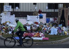 A makeshift memorial is seen outside the French Embassy November 17, 2015 in Washington, DC. The memorial has being created at the embassy's front gate to honor the victims of last week's coordinated shooting and bomb attacks in Paris .