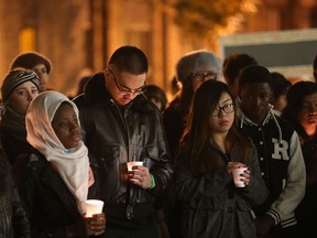 University of Windsor students take part in a candlelight vigil to promote world peace and  to denounce terror around the world.