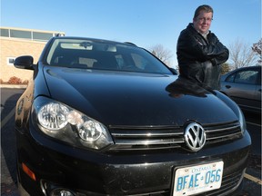 Dr. Darren Cargill is shown with his 2012 Volkswagen TDI Golf station wagon, one of the vehicles affected by the diesel scandal. Cargill says the carmaker is doing a poor job of communicating with its customers.