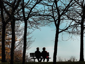 A couple enjoys a warm and sunny day in Windsor, Ont. on Monday, Nov. 2, 2015.