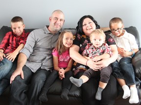 The Meloche family (from left: Ethan, Heath, Jai-lynn, Sonia, Christian and Nathan) are shown in their Tecumseh home.