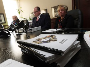 Treasurer Onorio Colucci, left, Mayor Drew Dilkens and CAO Helga Reidel discuss the 2016 City of Windsor budget at city hall in Windsor on Monday, Nov. 30, 2015.