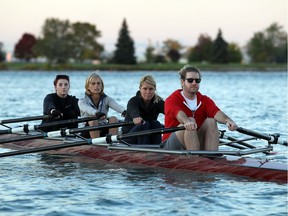 Tonya Foote, left, Marie Laurie, Star reporter Kelly Steele and  Matt Senechal take a boat out of the LaSalle Rowing Club on the Detroit River in LaSalle on Wednesday, Oct. 14, 2015.