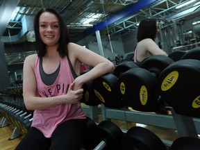 Mackenzie Walker works out at Fit4Less in Windsor recently. Walker lost close to 100 lbs through diet and exercise and has written and ebook and has 66,000 followers on Instagram.