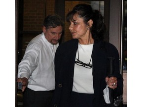 Sandra Zaher leaves Superior Court with lawyer Pat Ducharme, November 24, 2014.
