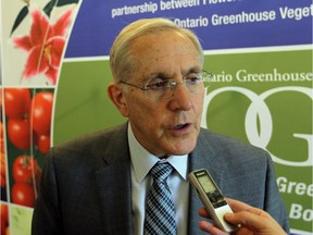 WINDSOR, ONTARIO - JUNE 23, 2015 - Bob Chiarelli, Minister of Energy met with local greenhouse operators at WindsorEssex Economic Development Corporation to talk about greenhouse operators who have benefited from various electrical programs. (JASON KRYK/The Windsor Star)