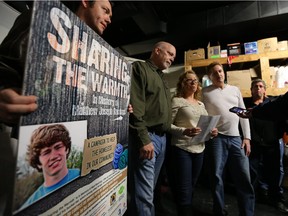 Bryan LaMarsh, Joy Rawlings and Paul Rawlings speak during a news conference announcing a donation to Street Help on Wyandotte Street East in Windsor, Ont., on Wednesday, Nov. 25, 2015, in honour of their late son Matt Rawlings.