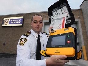 Essex-Windsor EMS Deputy Chief Justin Lammers displays a Lifepak 1000 defibrillator Dec. 3, 2015.