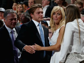 Brendan Lemieux celebrates with family after being selected #31 by the Buffalo Sabres on Day Two of the 2014 NHL Draft at the Wells Fargo Center on June 28, 2014 in Philadelphia, Pennsylvania.  (Photo by Bruce Bennett/Getty Images)