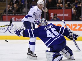 Toronto Maple Leafs' goalie Jonathan Bernier(45) makes the stop on Tampa Bay Lightning's Steve Stamkos (91) during third period NHL hockey action, in Toronto, on Tuesday, Dec. 15, 2015. THE CANADIAN PRESS/Frank Gunn