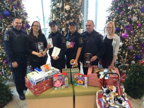 Officers with Canada's Border Services Agency donated more than $2,000 worth of toys and gifts to kids at Windsor Regional Hospital on Tuesday, Dec. 22, 2015. (Jason Kryk/Windsor Star)